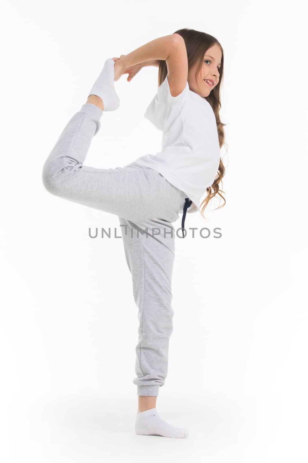 Gild doing stretching exercise isolated on white background