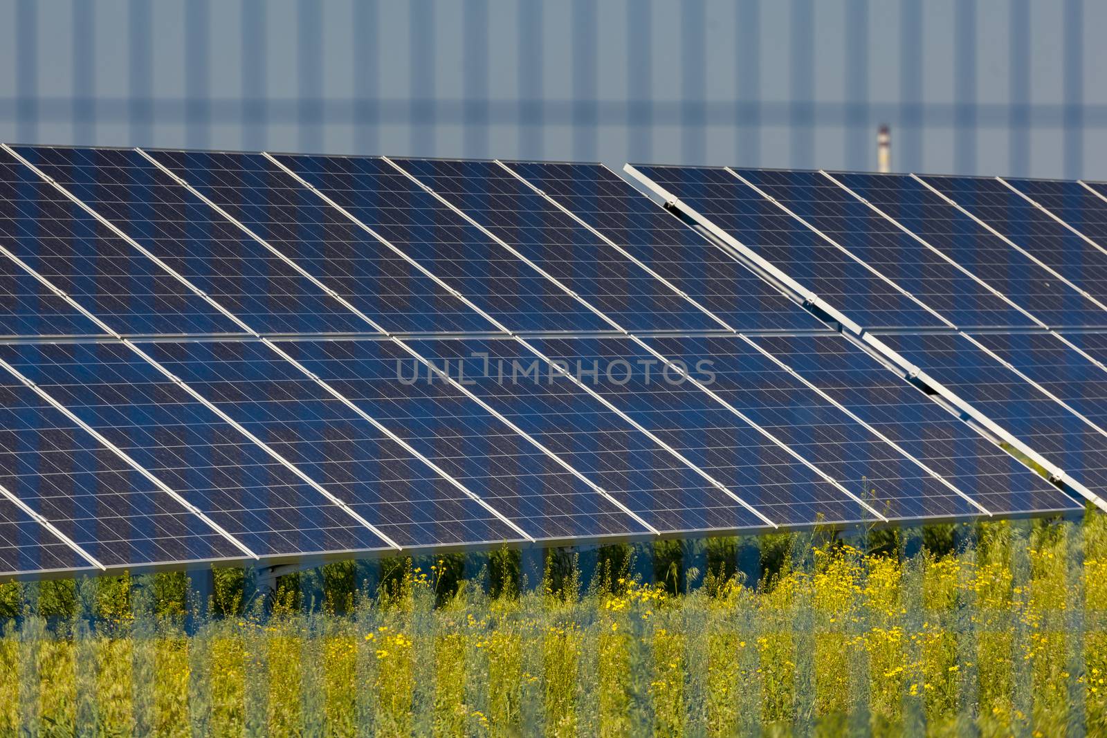 Grin clean electric power - Solar panel outside on grass photovoltaic