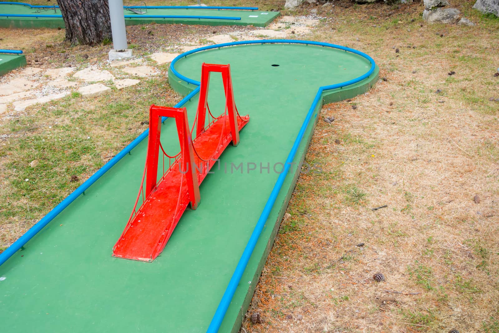 Mini golf course with obstacles by asafaric