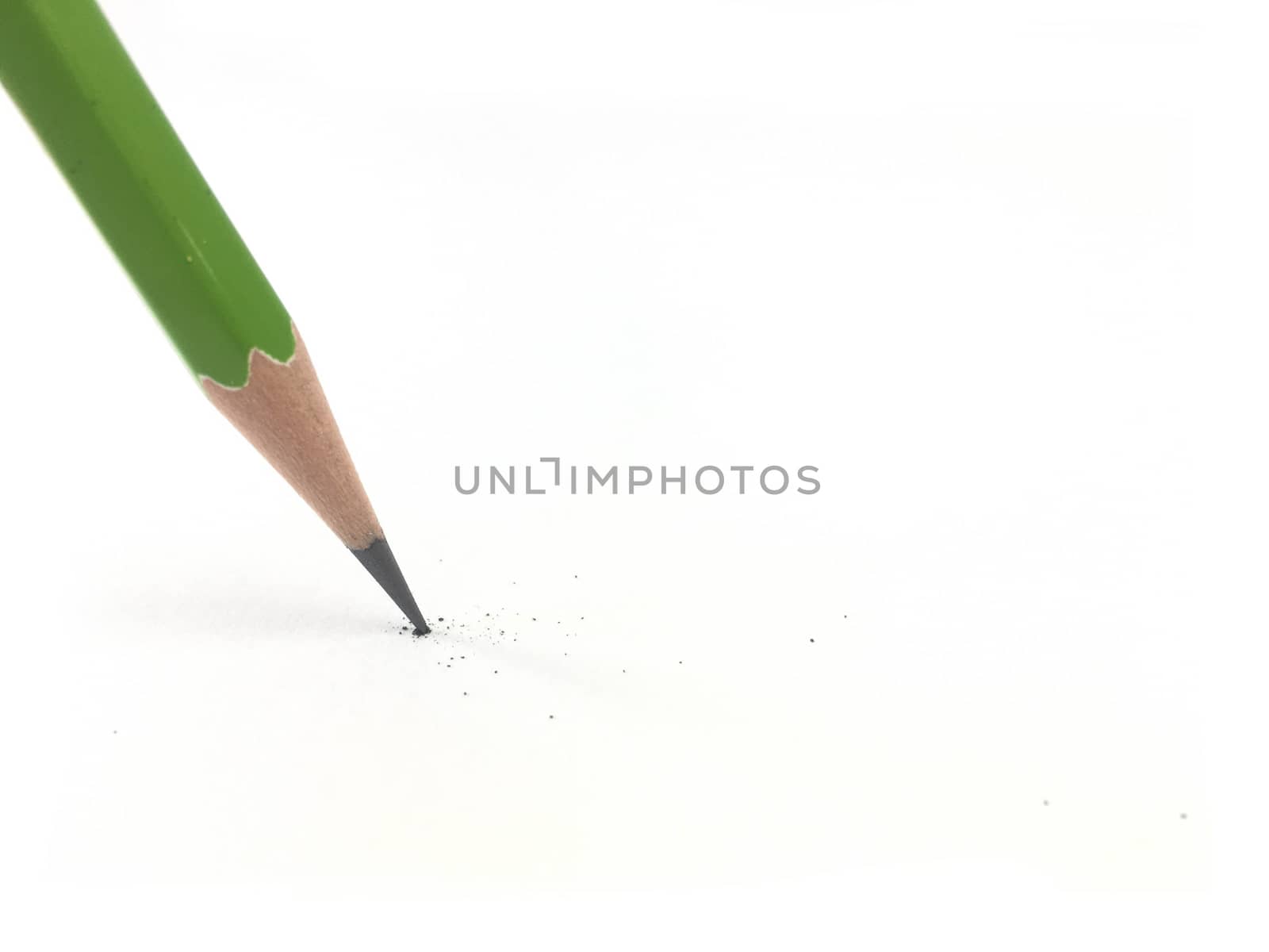 Started green pencil writing on paper.