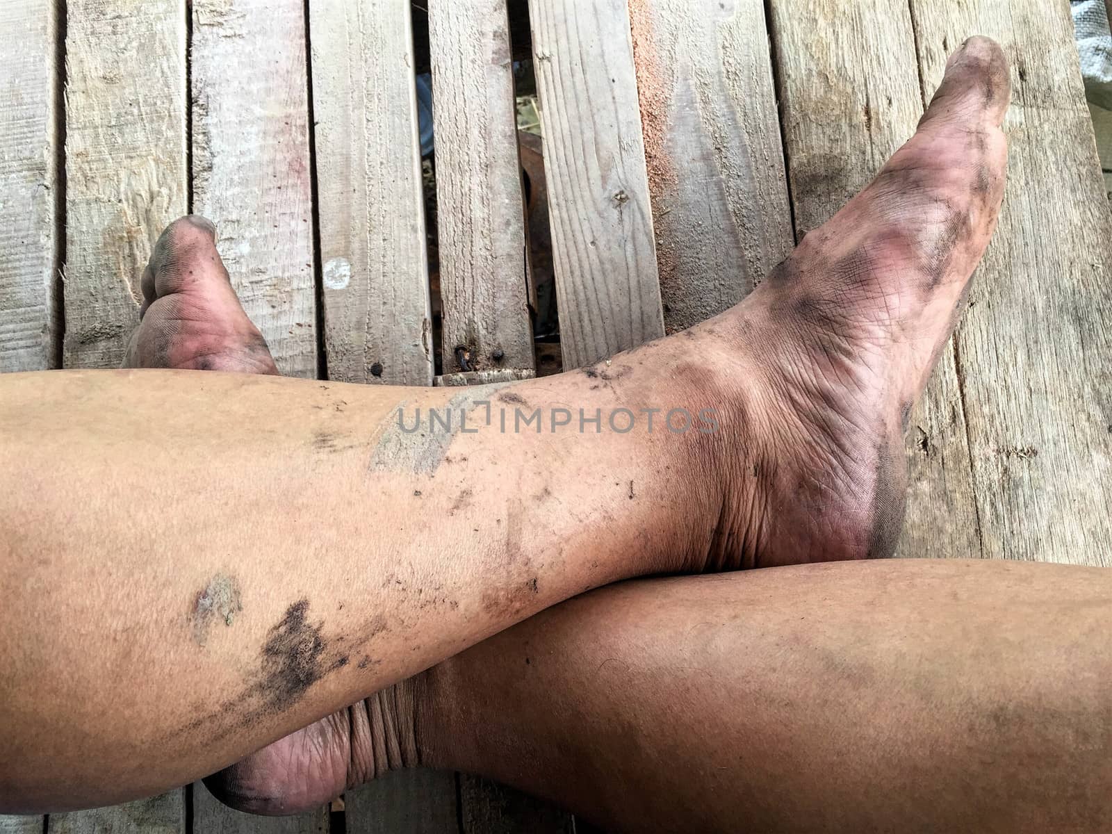Dirty feet on the wooden floor by e22xua