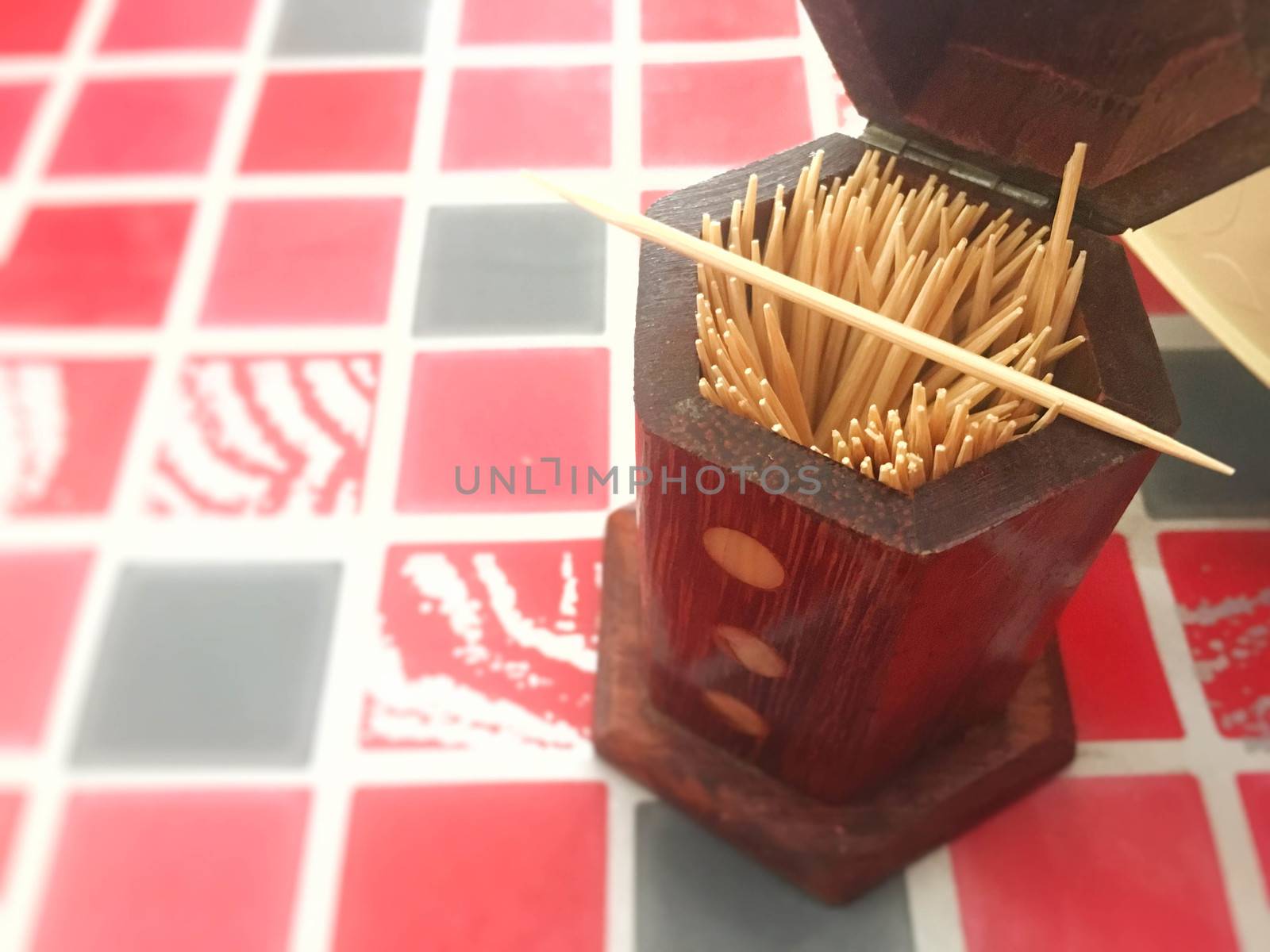 the wooden  toothpick in wooden box