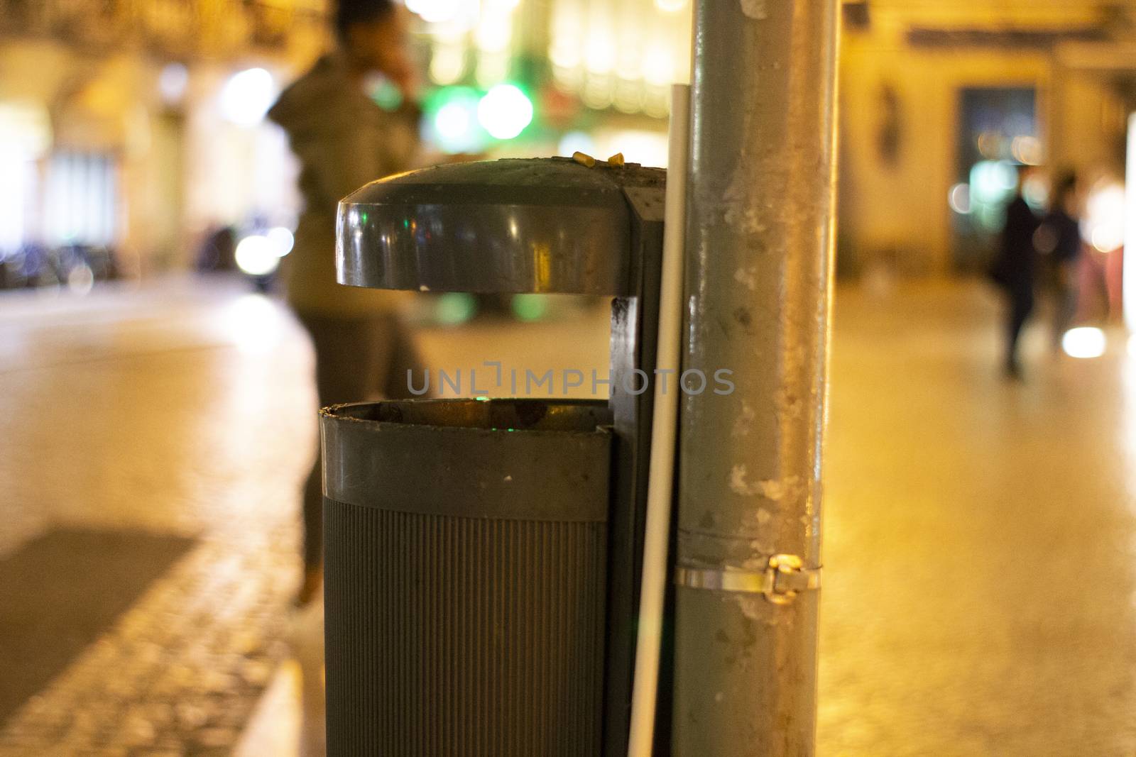 street ashtray in urban-degraded night time