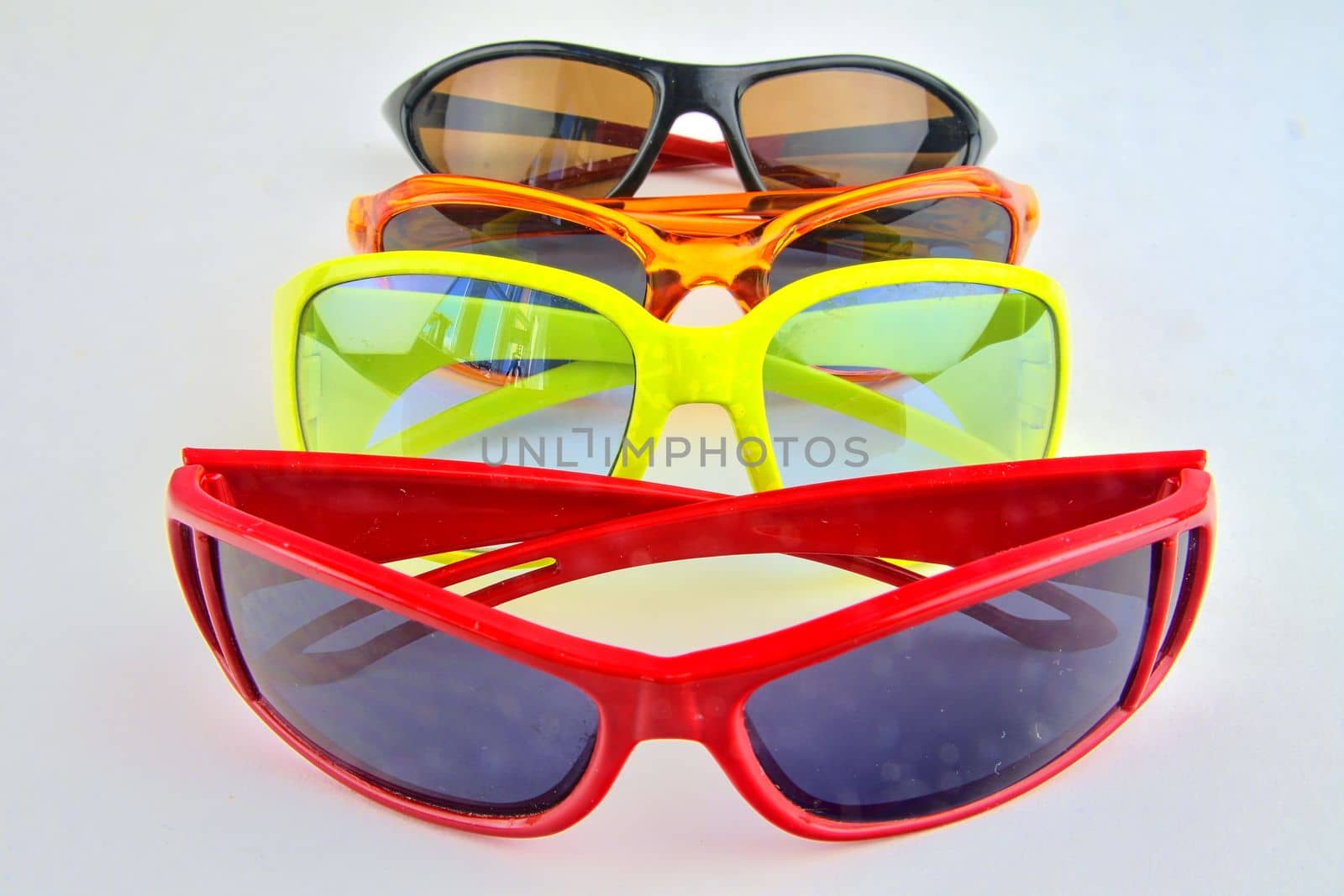 Set of various glasses. Stylish sunglasses for women and children. Eye glasses collection on white background.