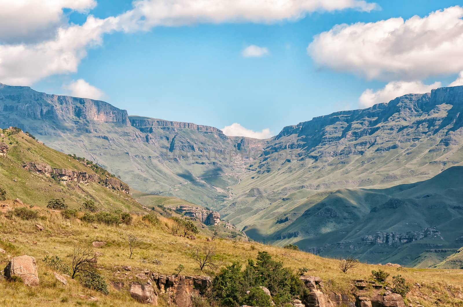 Landscape on the road to the Sani Pass border post near Himeville, in the Kwazulu-Natal Province. The hairpin bends of the Sani pass is visible in the back