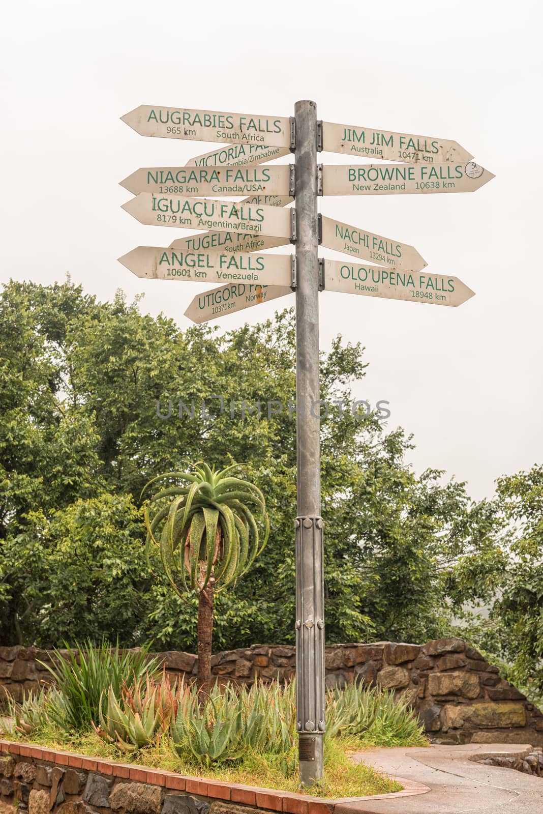 A signpost, showing the distances to famous waterfall of the world, at the Howick Falls, in Howick, in the Kwazulu-Natal Midlands Meander