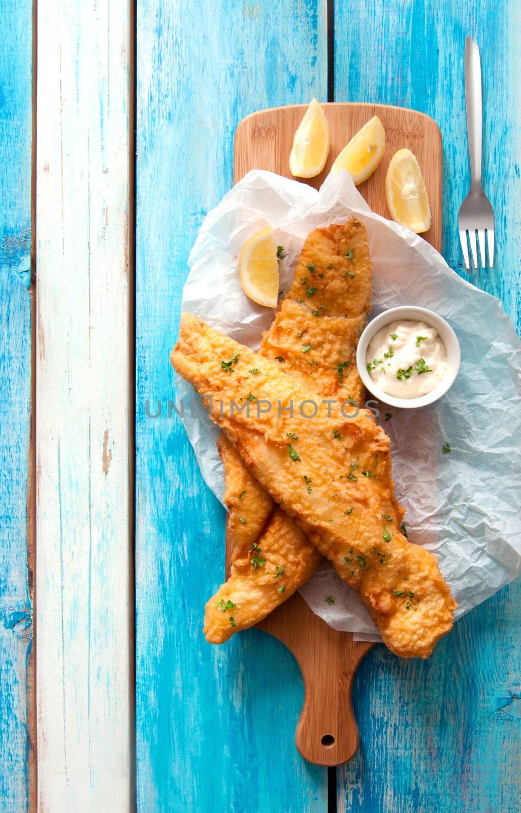 Two pieces of cod fried in batter