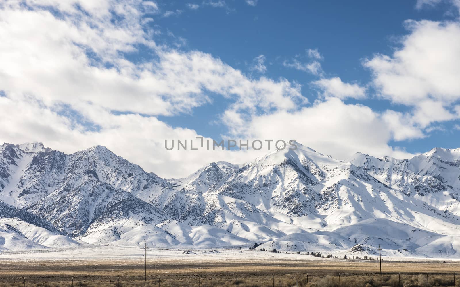 View of the SIerras in winter from highway 395 by Njean