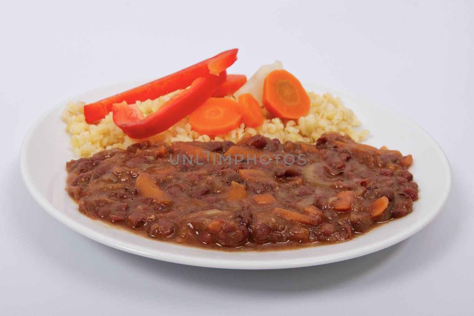 Azuki with vegetables on steam and bulgur on a white by neryx