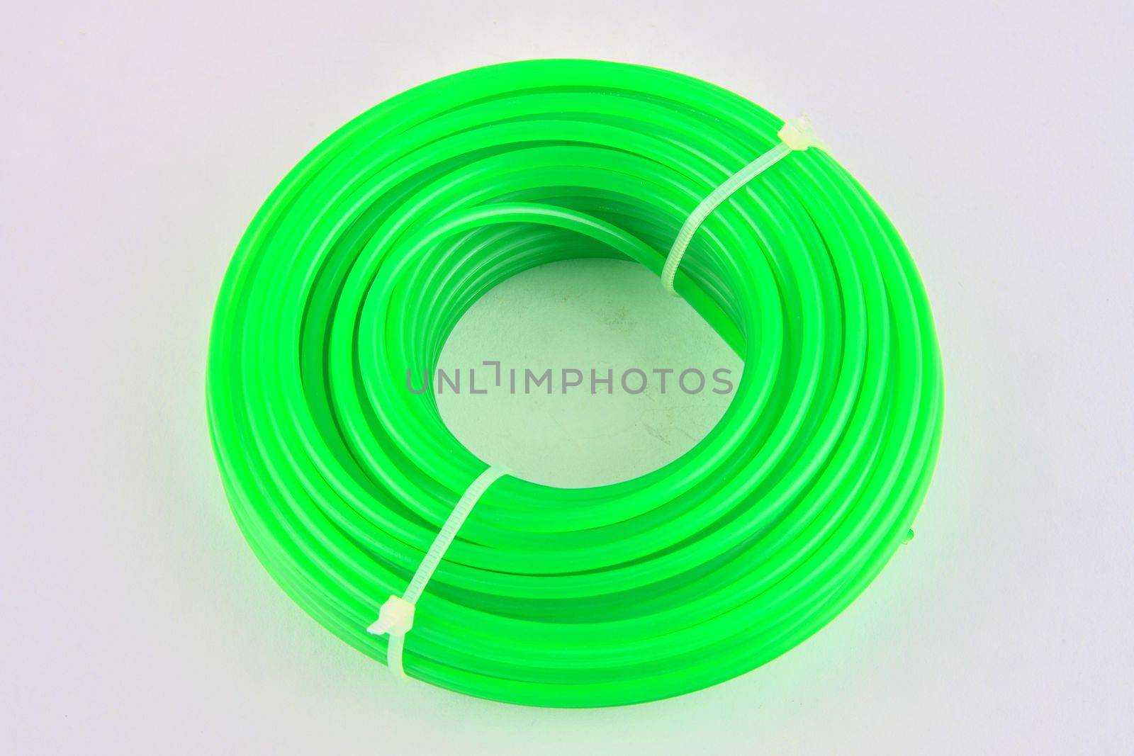 A string of grass cutter on white background.