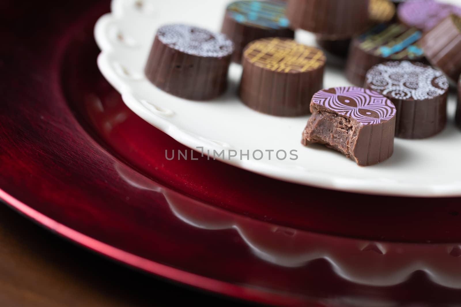 Artisan Fine Chocolate Candy On Serving Dish by Feverpitched