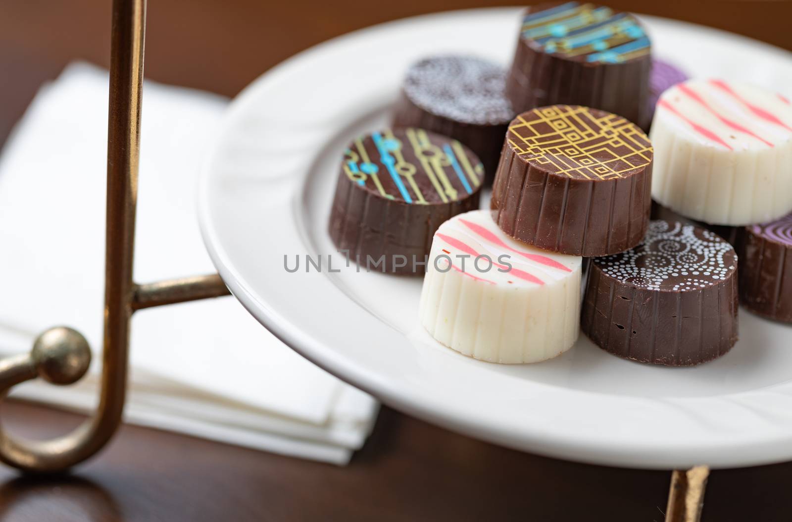 Artisan Fine Chocolate Candy On Serving Dish by Feverpitched