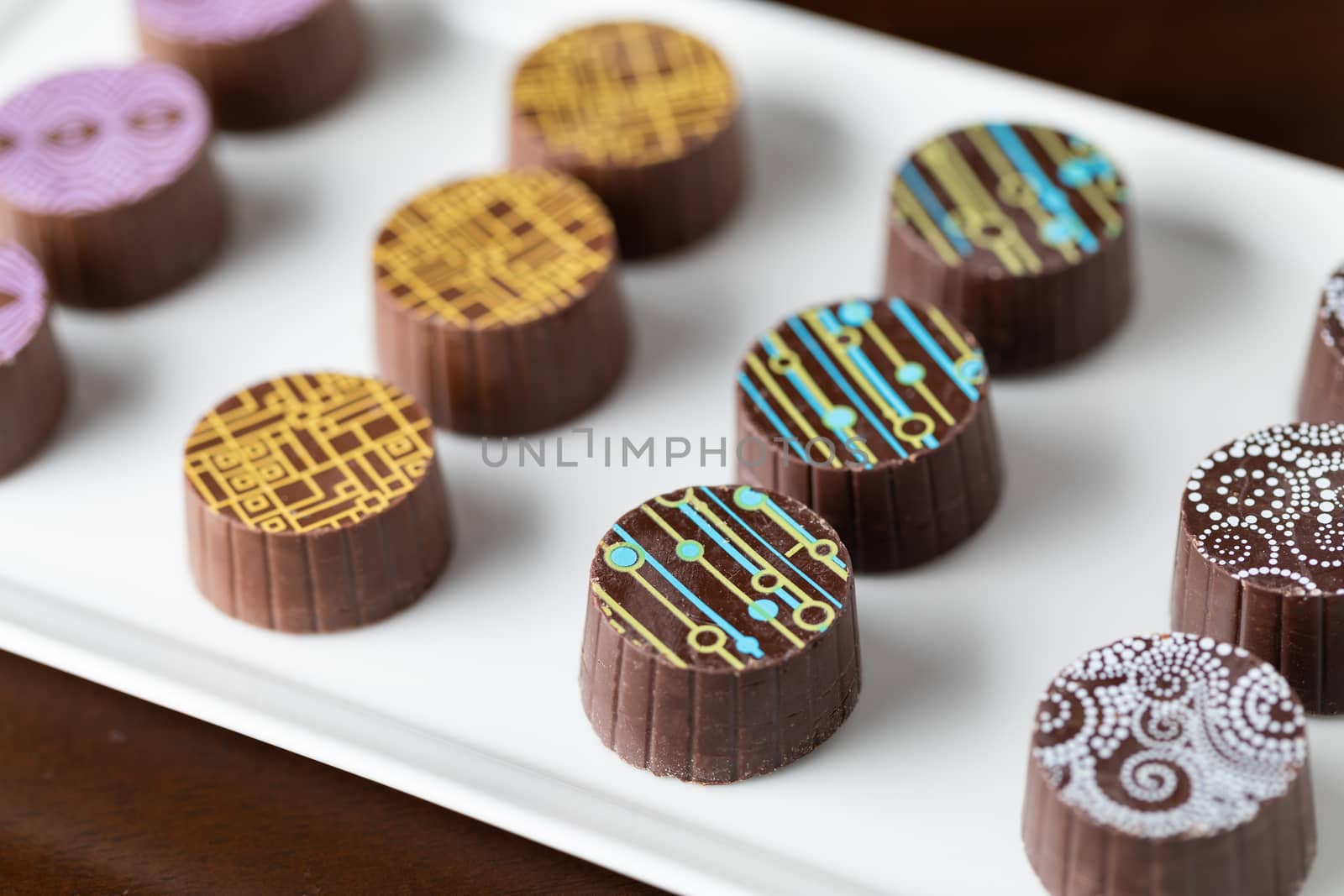 Artisan Fine Chocolate Candy On Serving Dish.