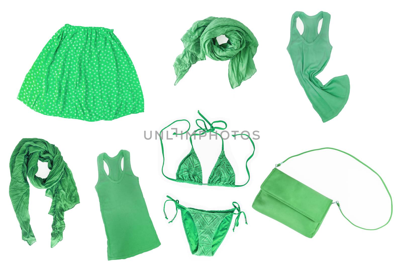 collage of fashionable green summer-spring female clothes and accessories isolated on white background. View from above