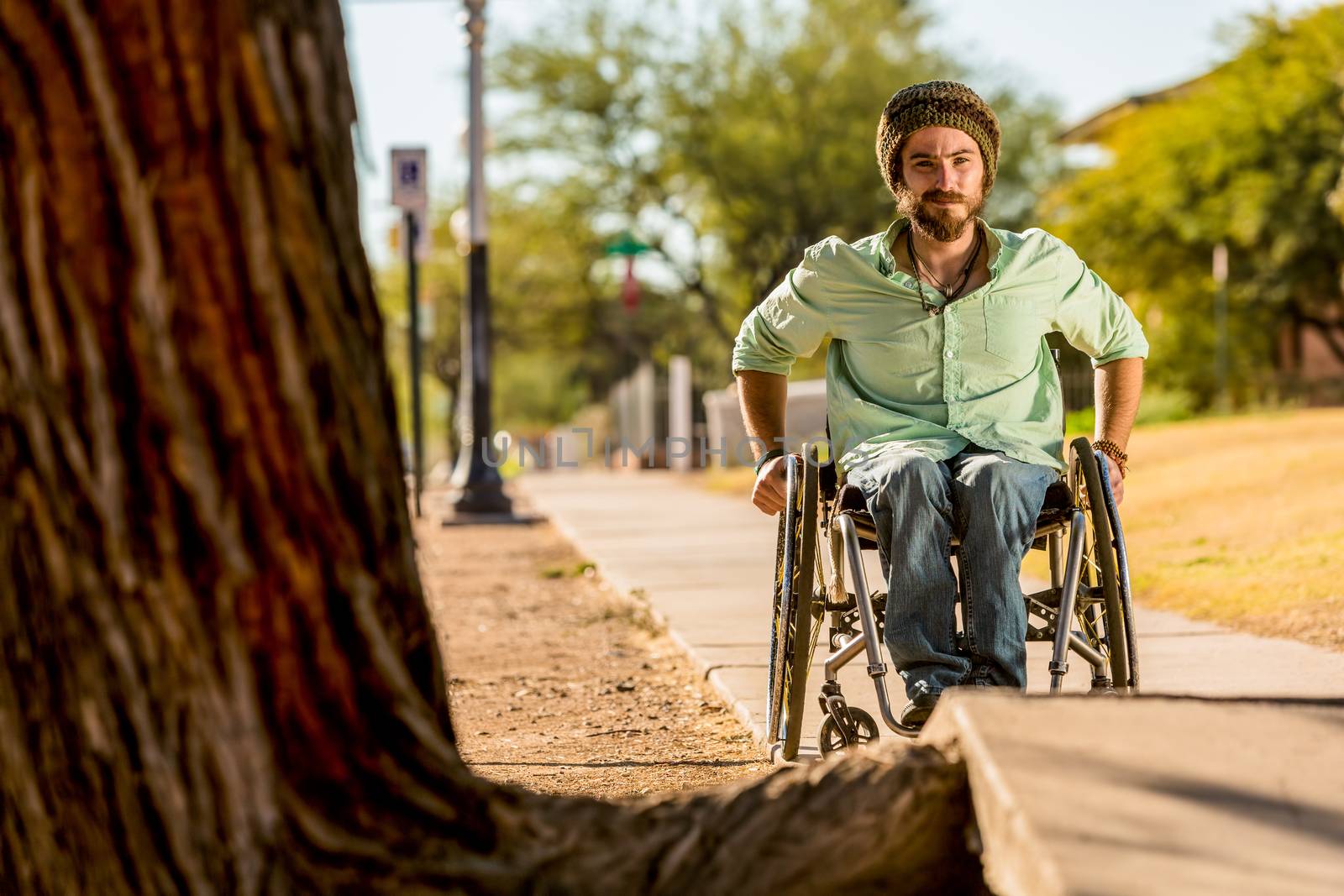 Man in Wheelchair Faces Sidewalk Obstacle by Creatista