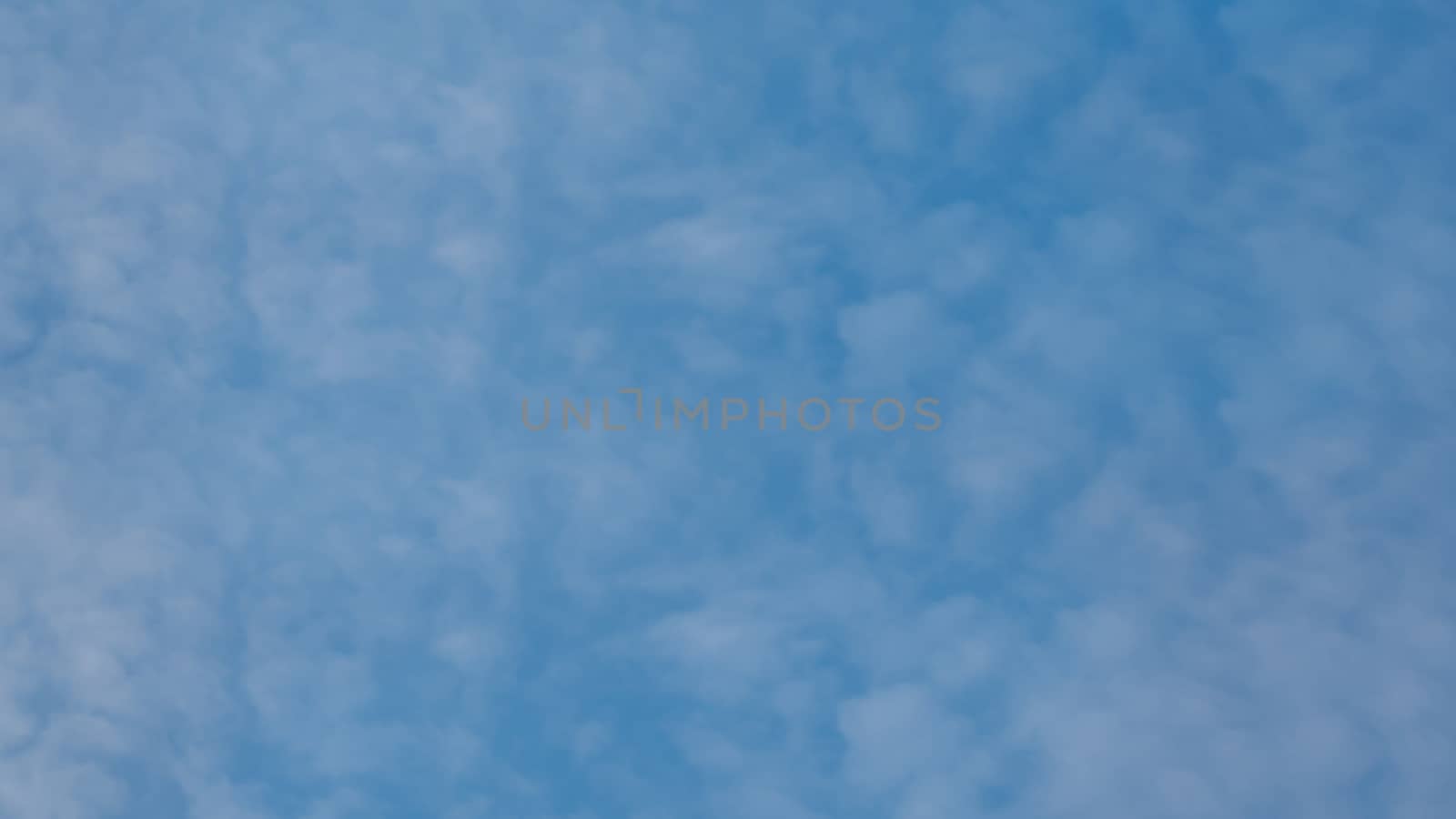 white clouds in the blue sky background
