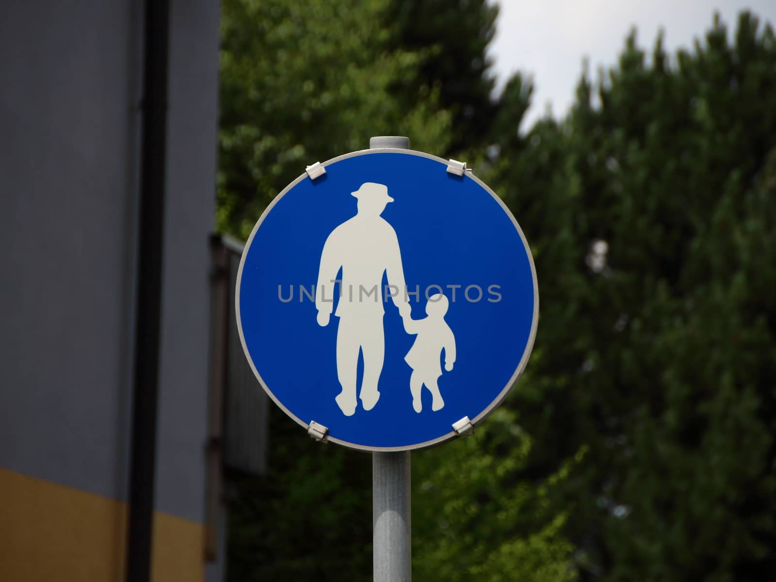 Isolated Blue Pedestrian Traffic Sign with Man and Child