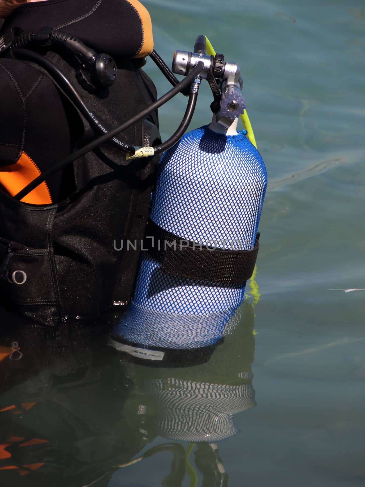 Closeup on Scuba Diving Equipment on backside of Diver in Water