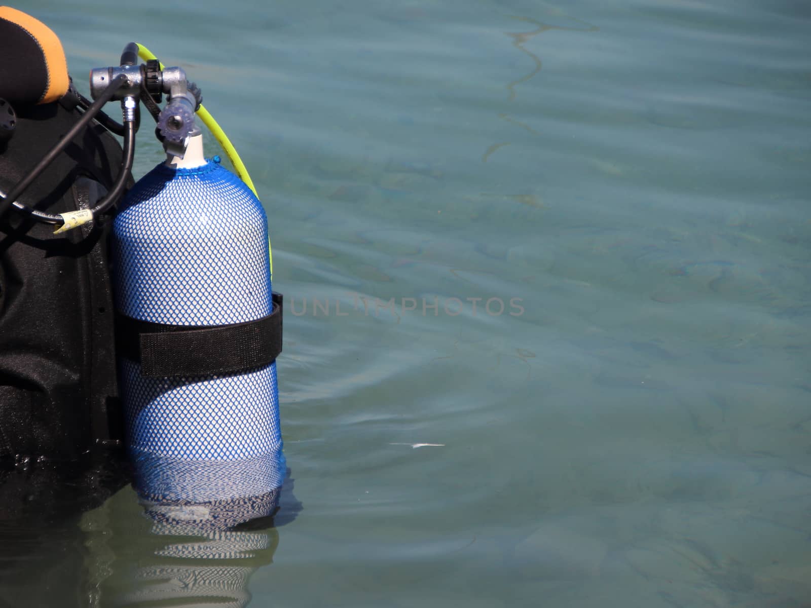 Closeup on Scuba Diving Equipment on backside of Diver in Water