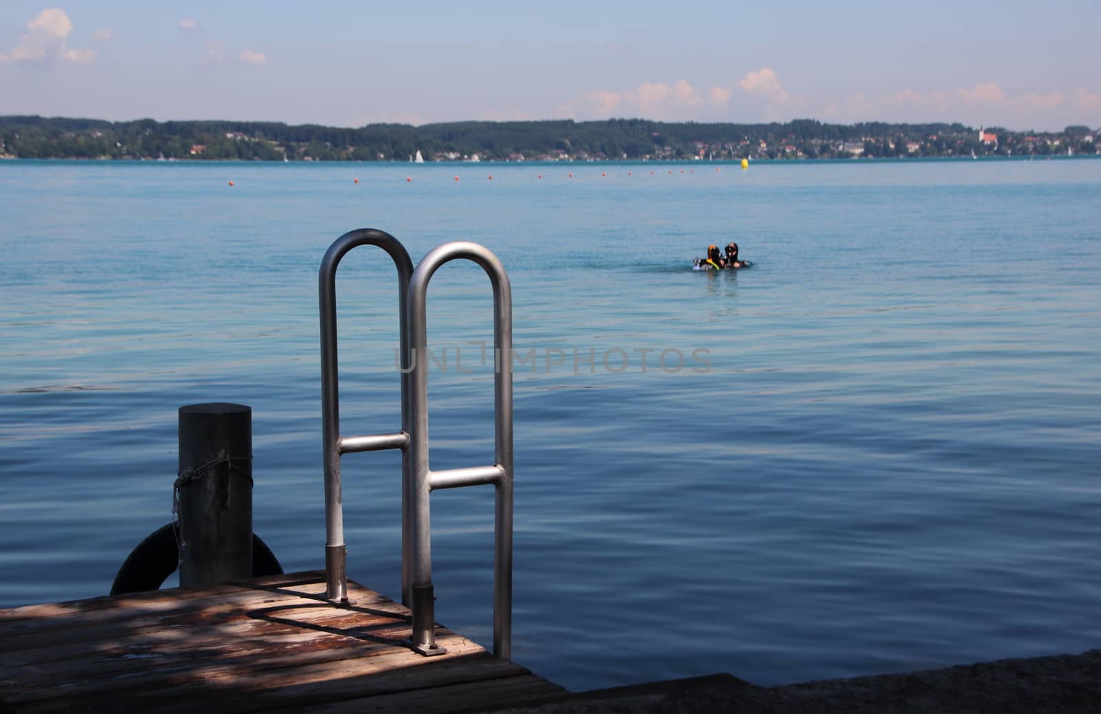 Svimmers Pier with Steel Ladder and Scuba Divers in Background