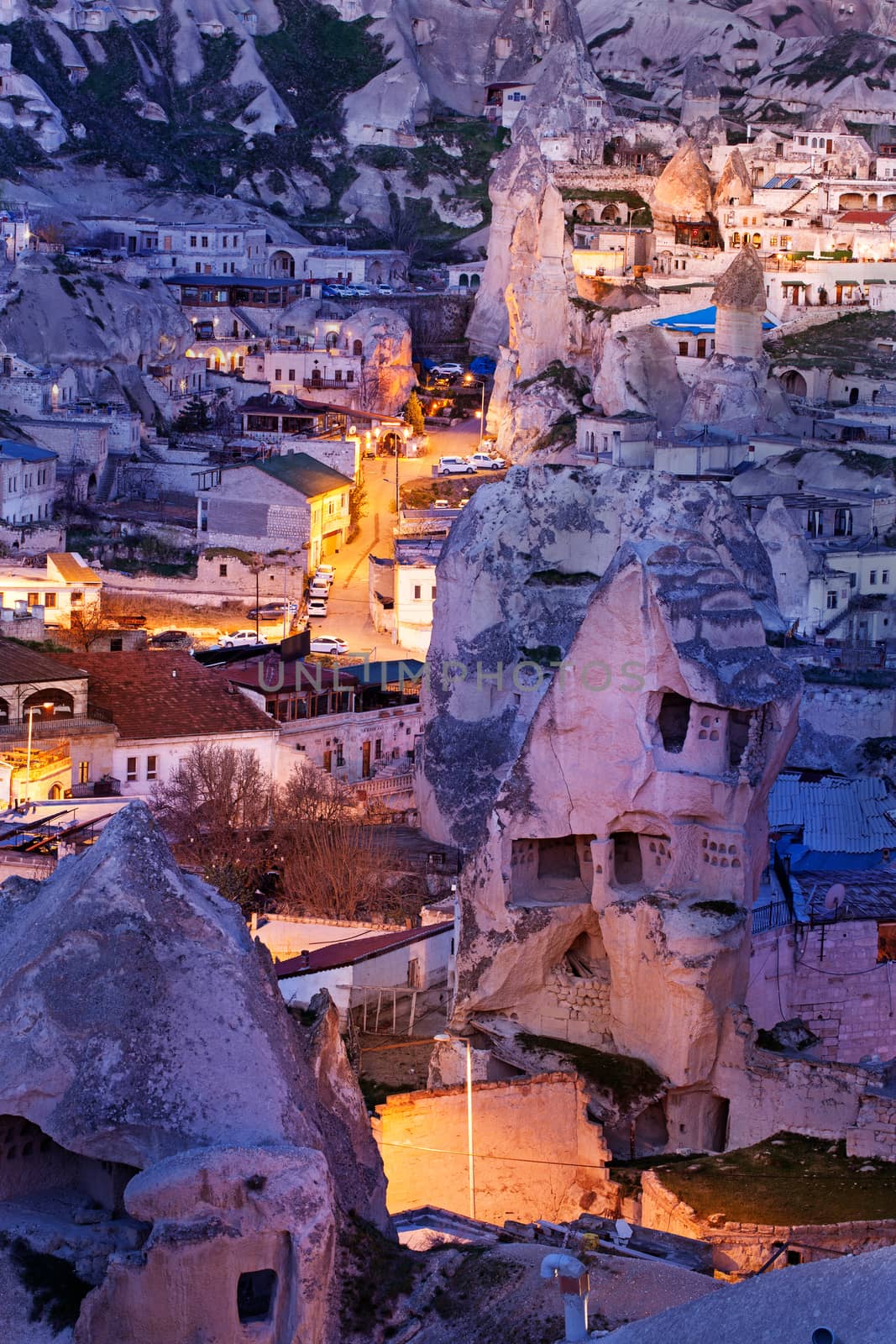 Cylindrical stone cliffs and cave houses in Goreme, Turkey