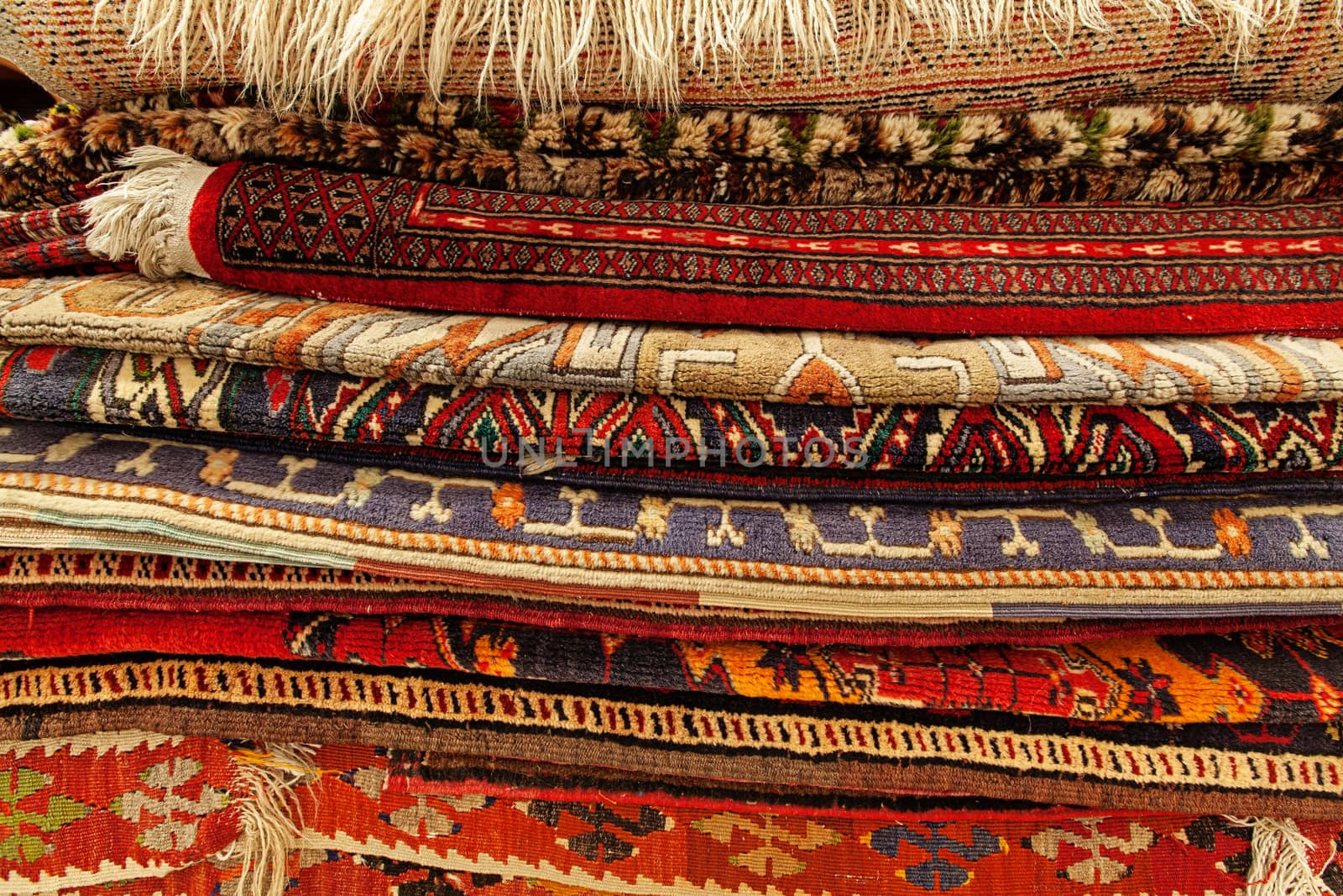 Assortment of turkish oriental carpets in street market