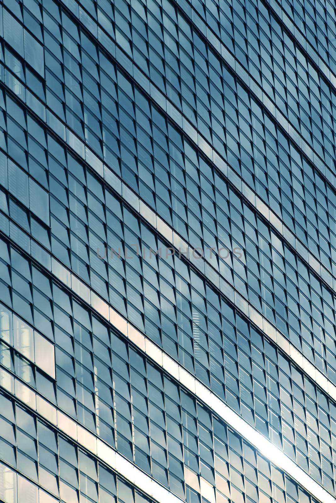 Modern business office building blue glass windows by BreakingTheWalls