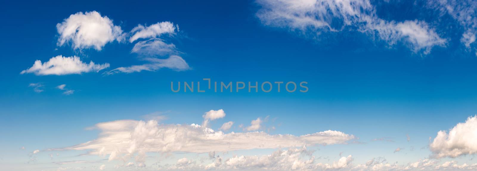 panorama of beautiful cloudscape on a blue sky by Pellinni