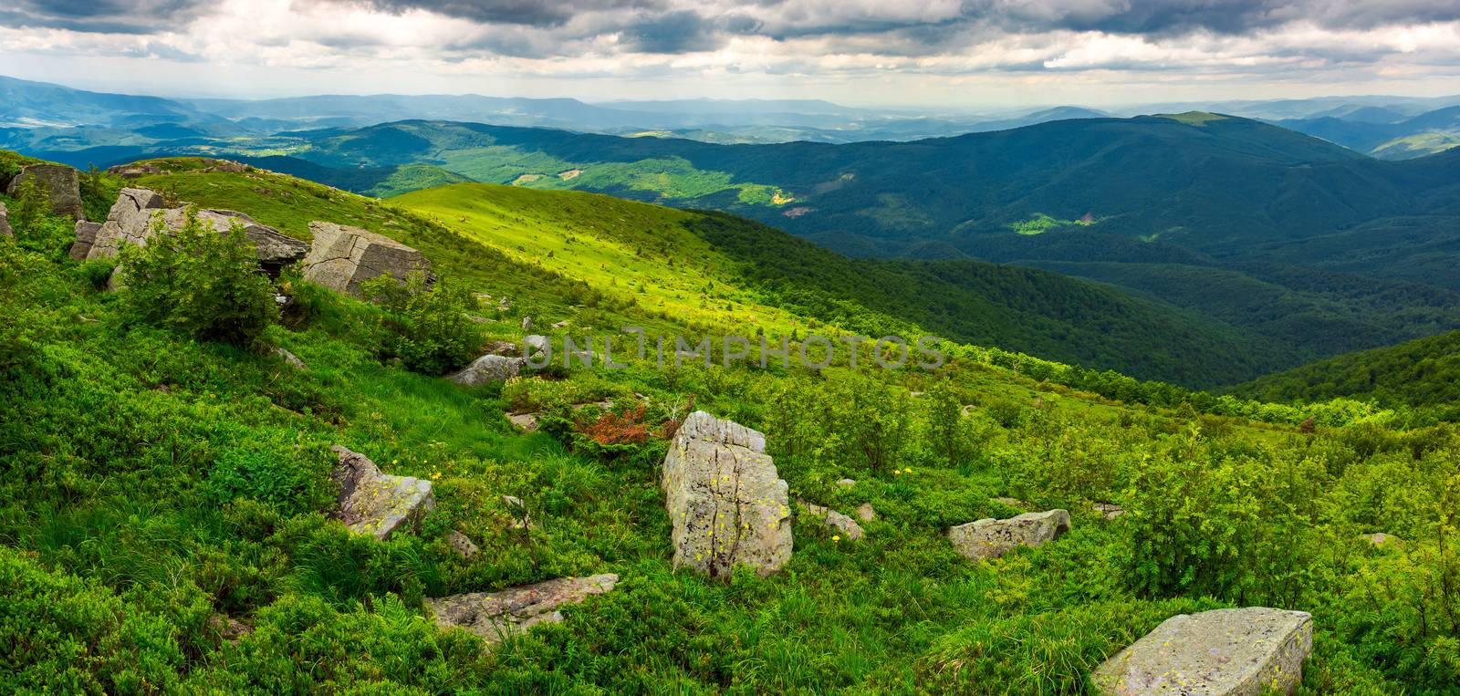 panorama of Runa mountain with boulders on hills. gorgeous landscape of amazing Carpathian mountains on a summer day with overcast sky