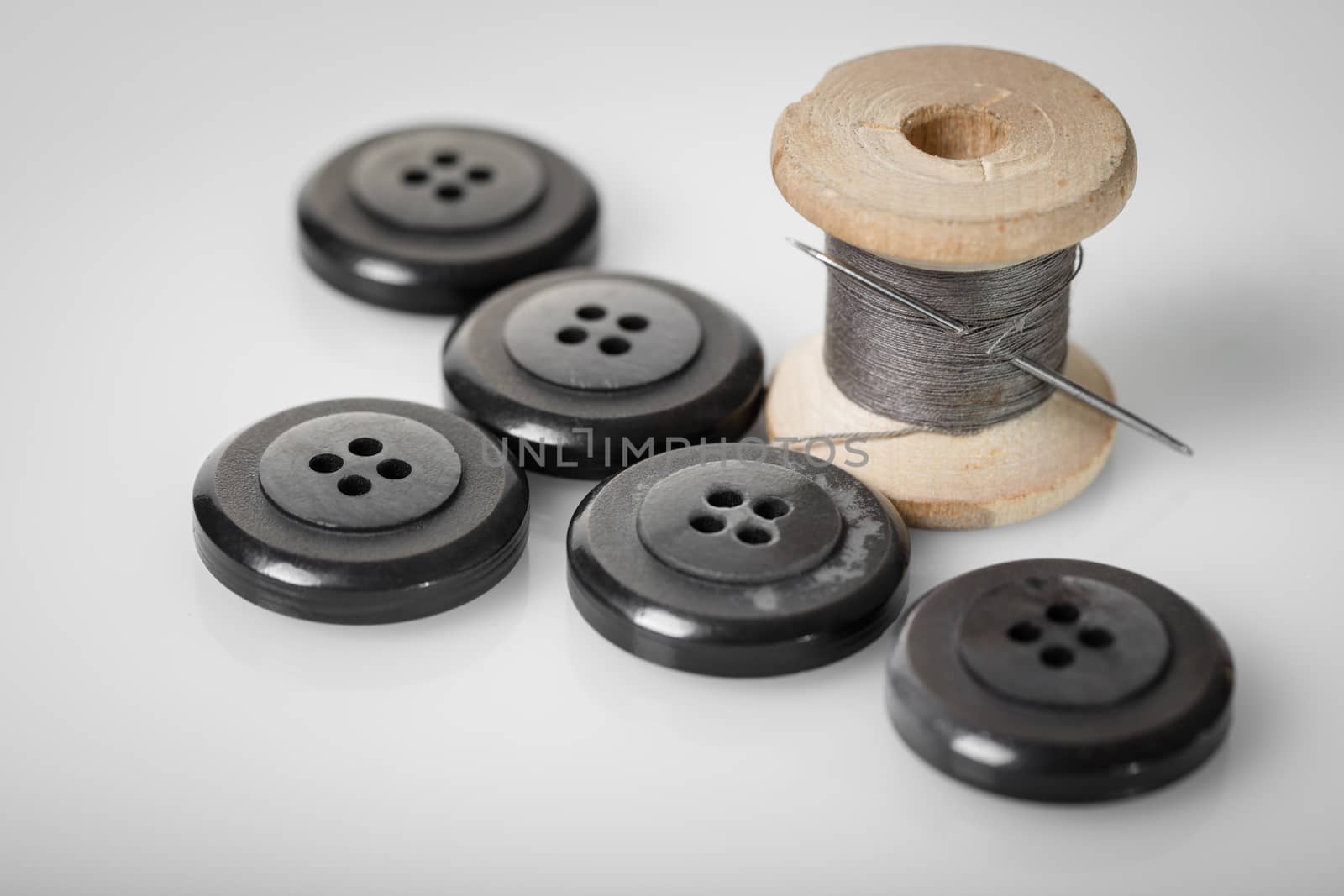 spool of thread and buttons by MegaArt