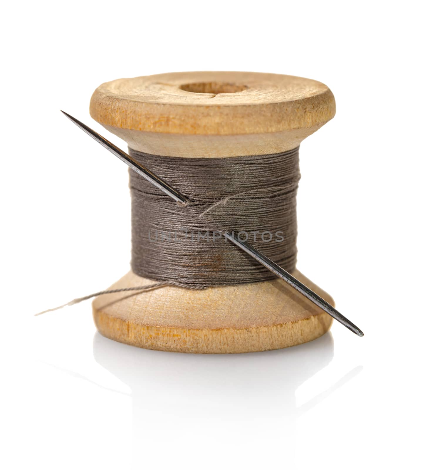 spool of brown threads  by MegaArt