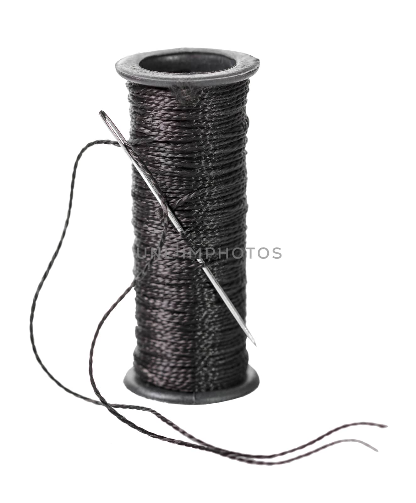 spool of black thread  by MegaArt