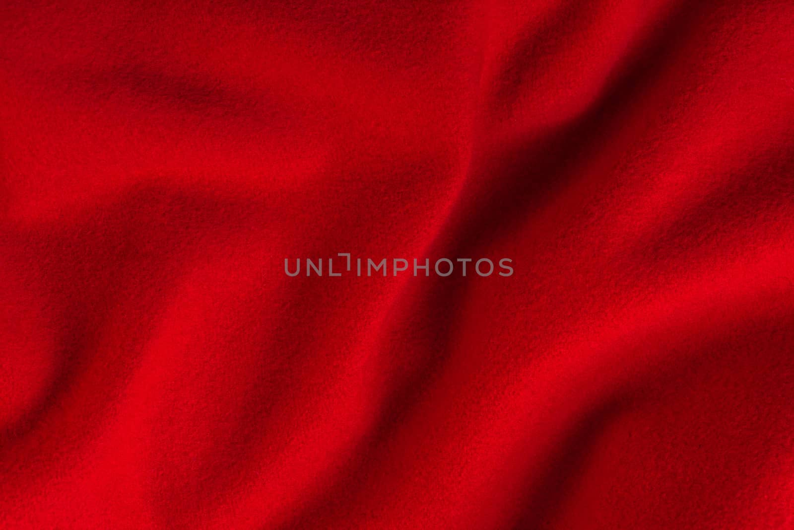 abstract background from the texture of red cashmere cloth