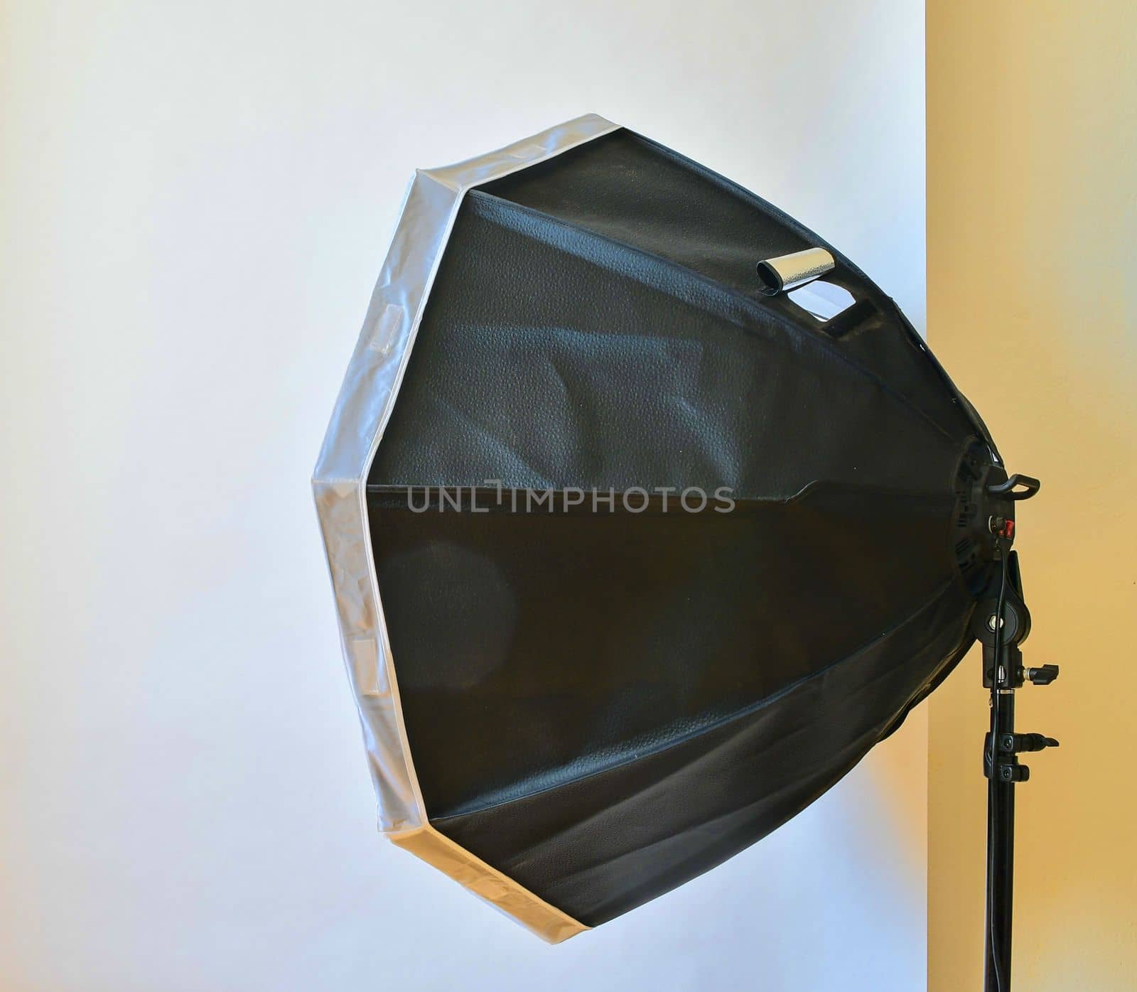 Empty photo studio with lighting equipment. White background in photo studio by roman_nerud