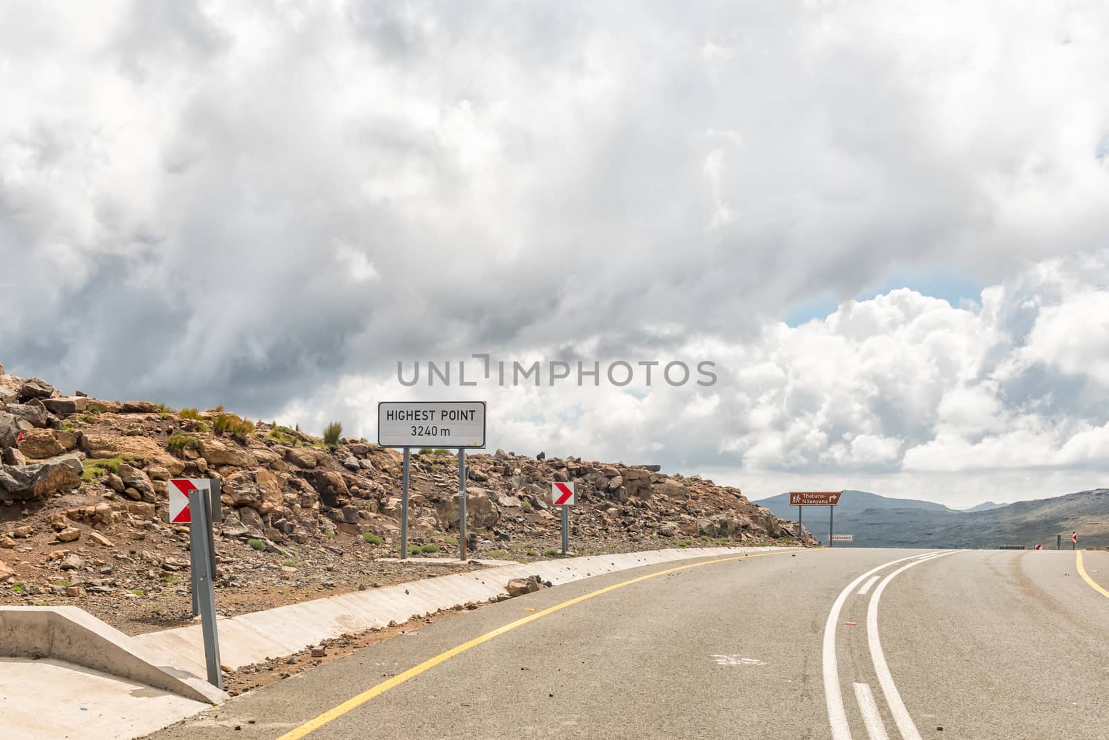 The highest point of  Black Mountain Pass in Lesotho. The top is 3240 meter above sea level. The directional sign to the Thabana Ntlenyana viewpoint is visible