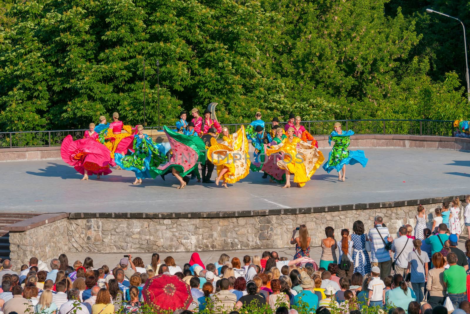 KIEV, UKRAINE - July 22 , 2016: Ukraina School of Dance Ensemble girls and boys dressed in traditional red Ukrainian embroidered costume clothes dancing