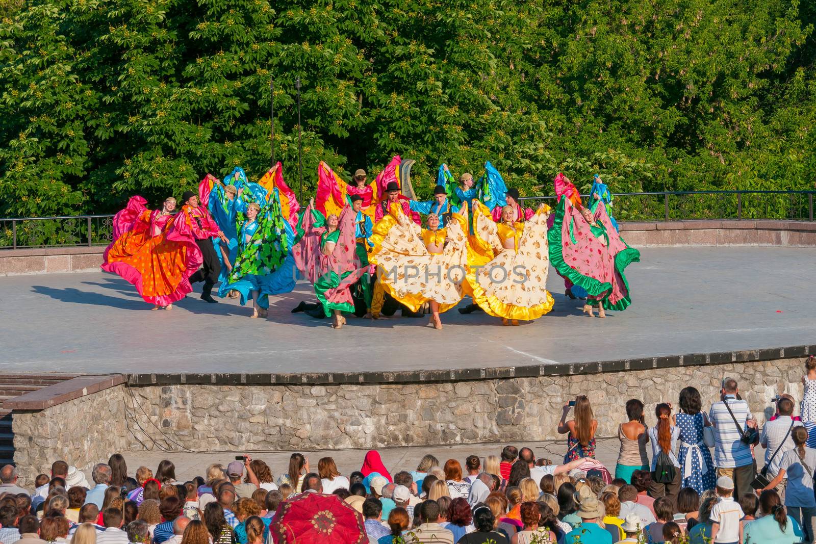 KIEV, UKRAINE - July 22 , 2016: Ukraina School of Dance Ensemble girls and boys dressed in traditional red Ukrainian embroidered costume clothes dancing