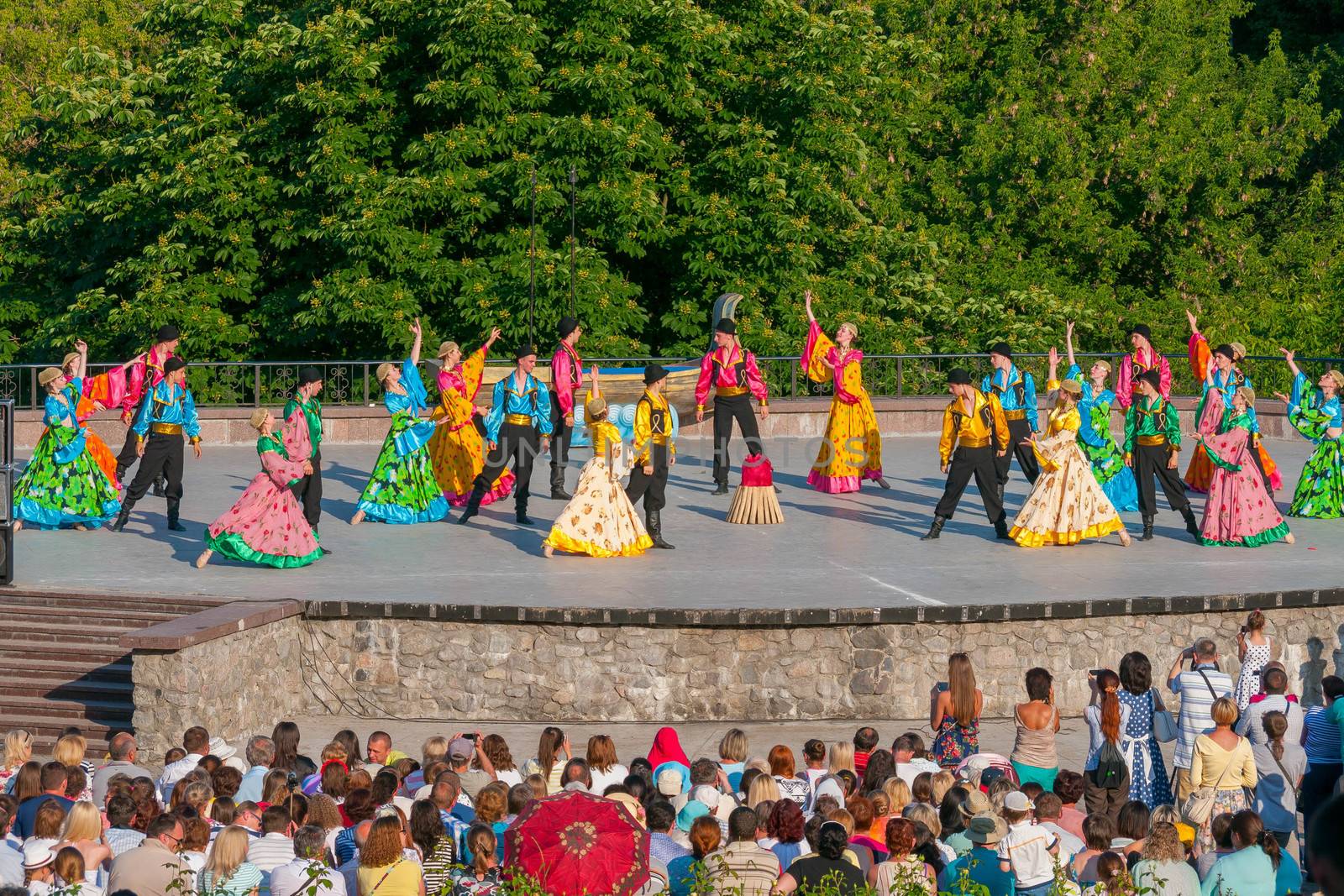 KIEV, UKRAINE - July 22 , 2016: Ukraina School of Dance Ensemble girls and boys dressed in traditional red Ukrainian embroidered costume clothes dancing