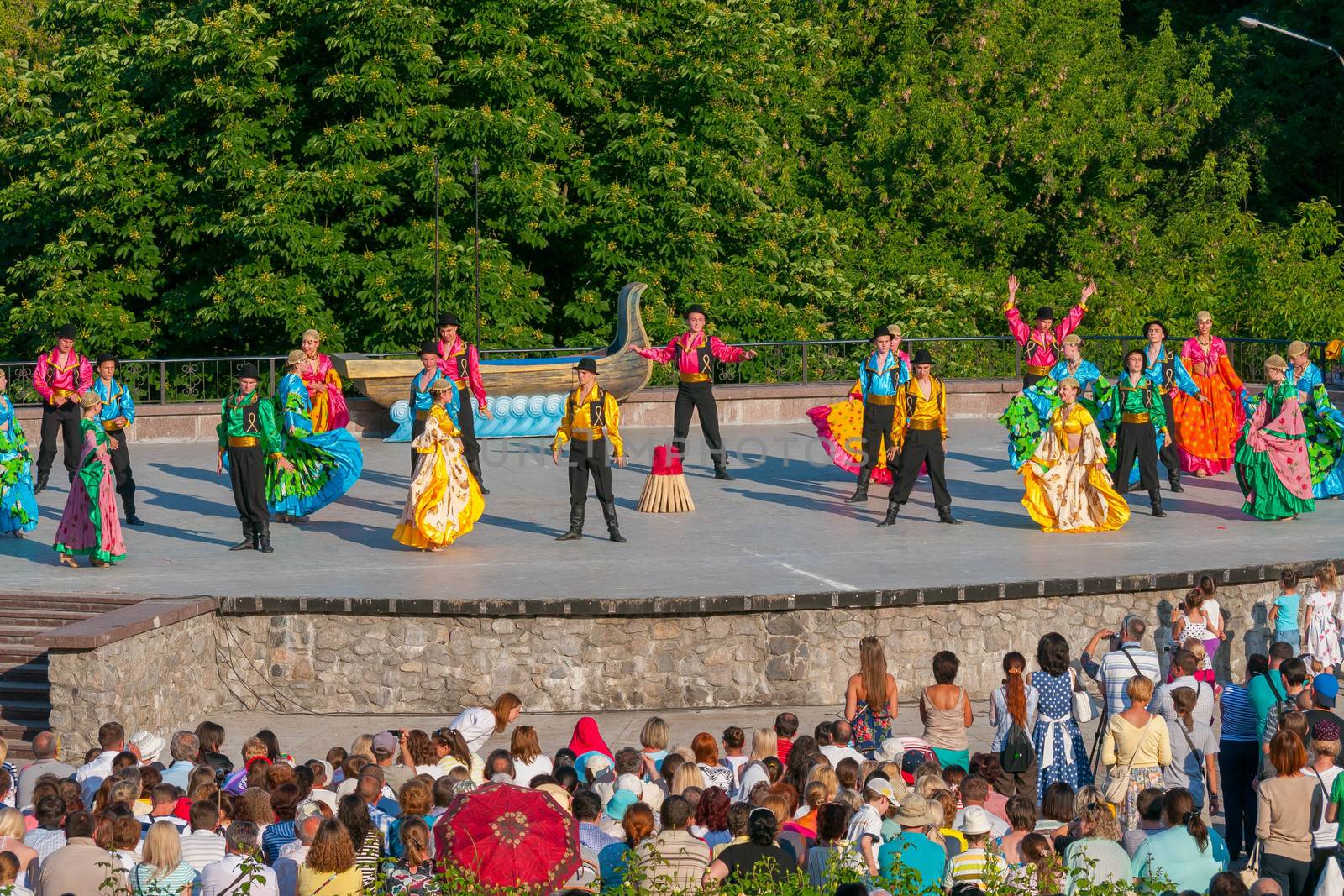 KIEV, UKRAINE - July 22 , 2016: Ukraina School of Dance Ensemble girls and boys dressed in traditional red Ukrainian embroidered costume clothes dancing