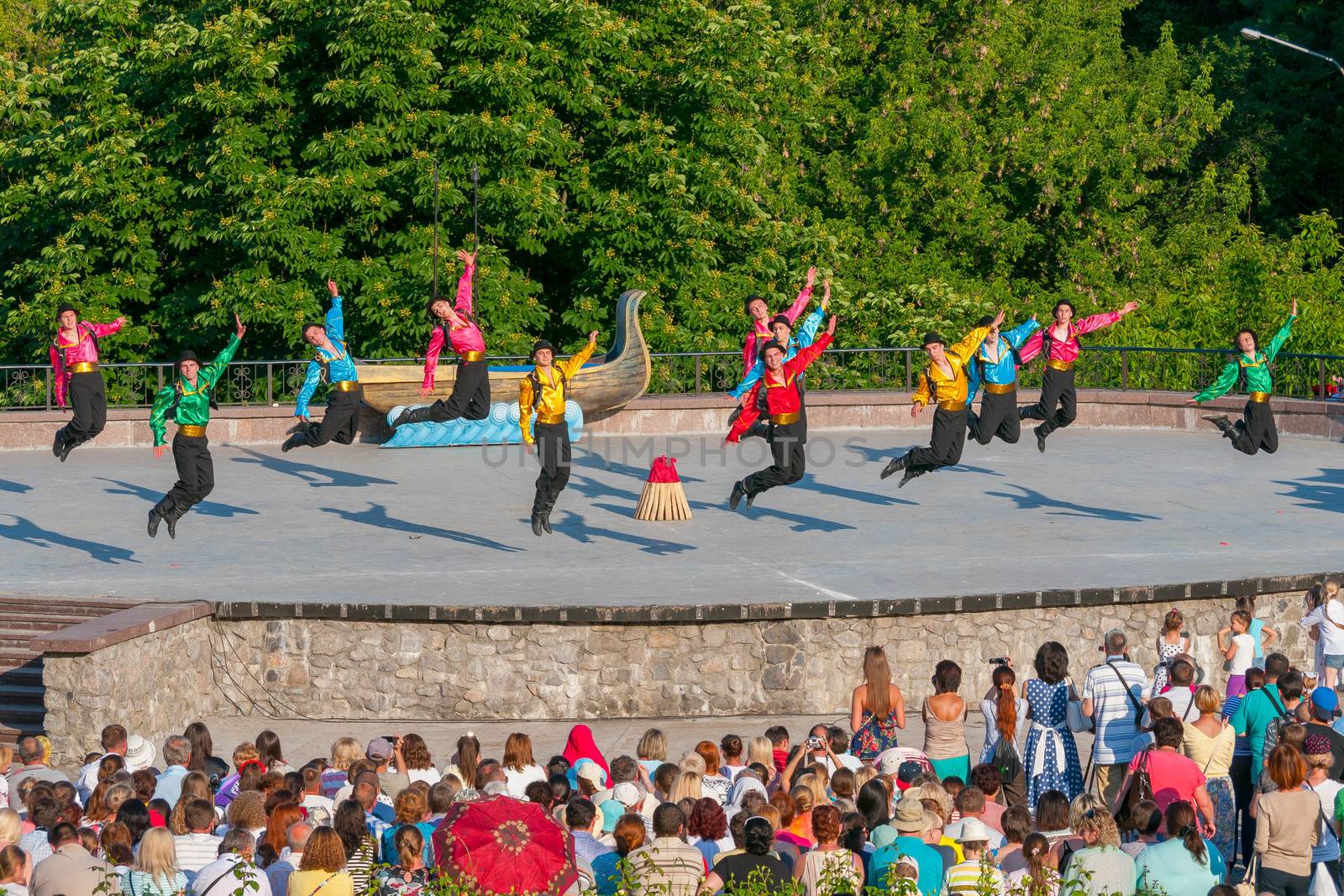 KIEV, UKRAINE - July 22 , 2016: Ukraina School of Dance Ensemble girls and boys dressed in traditional red Ukrainian embroidered costume clothes dancing