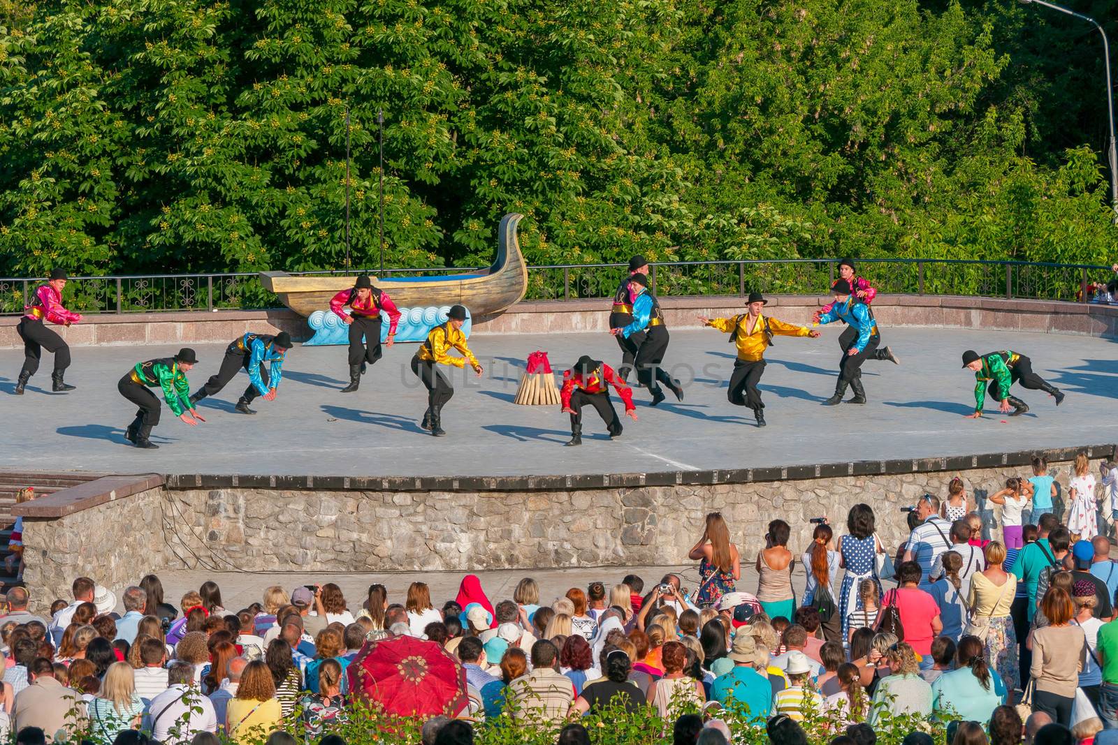 KIEV, UKRAINE - July 22 , 2016: Ukraina School of Dance Ensemble girls and boys dressed in traditional red Ukrainian embroidered costume clothes dancing