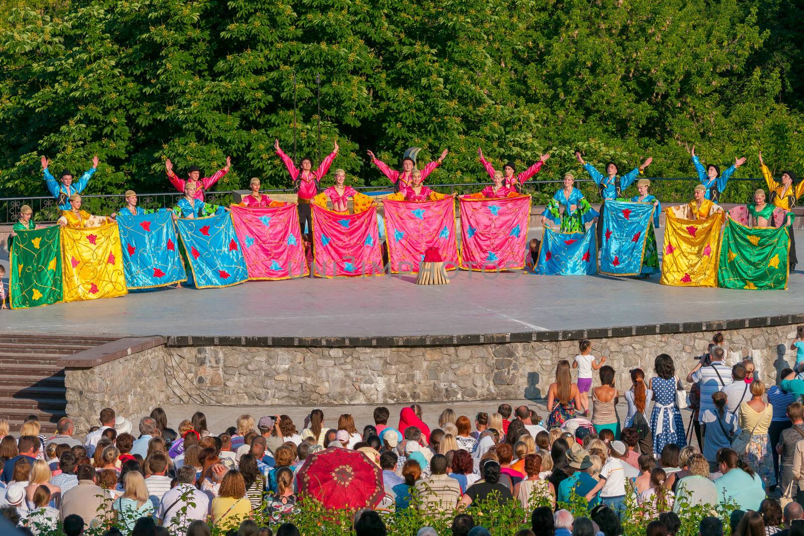 KIEV, UKRAINE - July 22 , 2016: Ukraina School of Dance Ensemble girls and boys dressed in traditional red Ukrainian embroidered costume clothes dancing