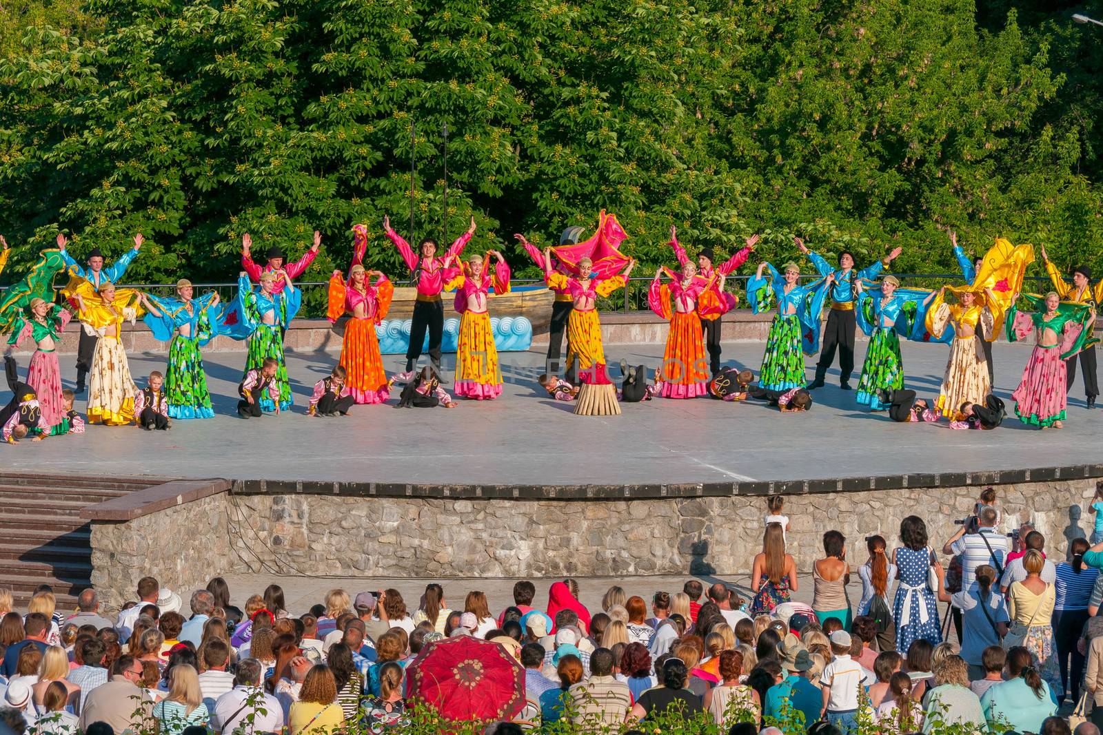 KIEV, UKRAINE - July 22 , 2016: Ukraina School of Dance Ensemble girls and boys dressed in traditional red Ukrainian embroidered costume clothes dancing