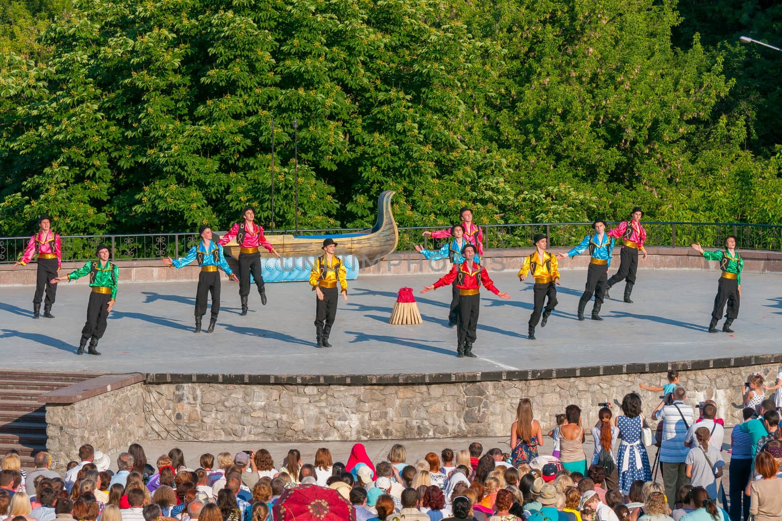 KIEV, UKRAINE - July 22 , 2016: Ukraina School of Dance Ensemble girls and boys dressed in traditional red Ukrainian embroidered costume clothes dancing