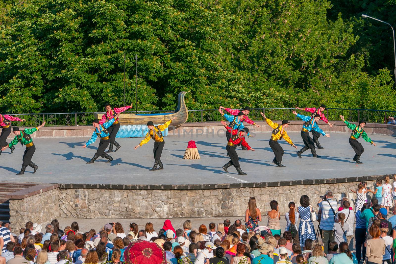 KIEV, UKRAINE - July 22 , 2016: Ukraina School of Dance Ensemble girls and boys dressed in traditional red Ukrainian embroidered costume clothes dancing