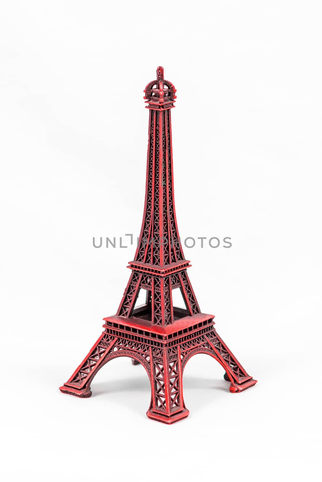 Red Eiffel Tower model, isolated on white background by marcorubino