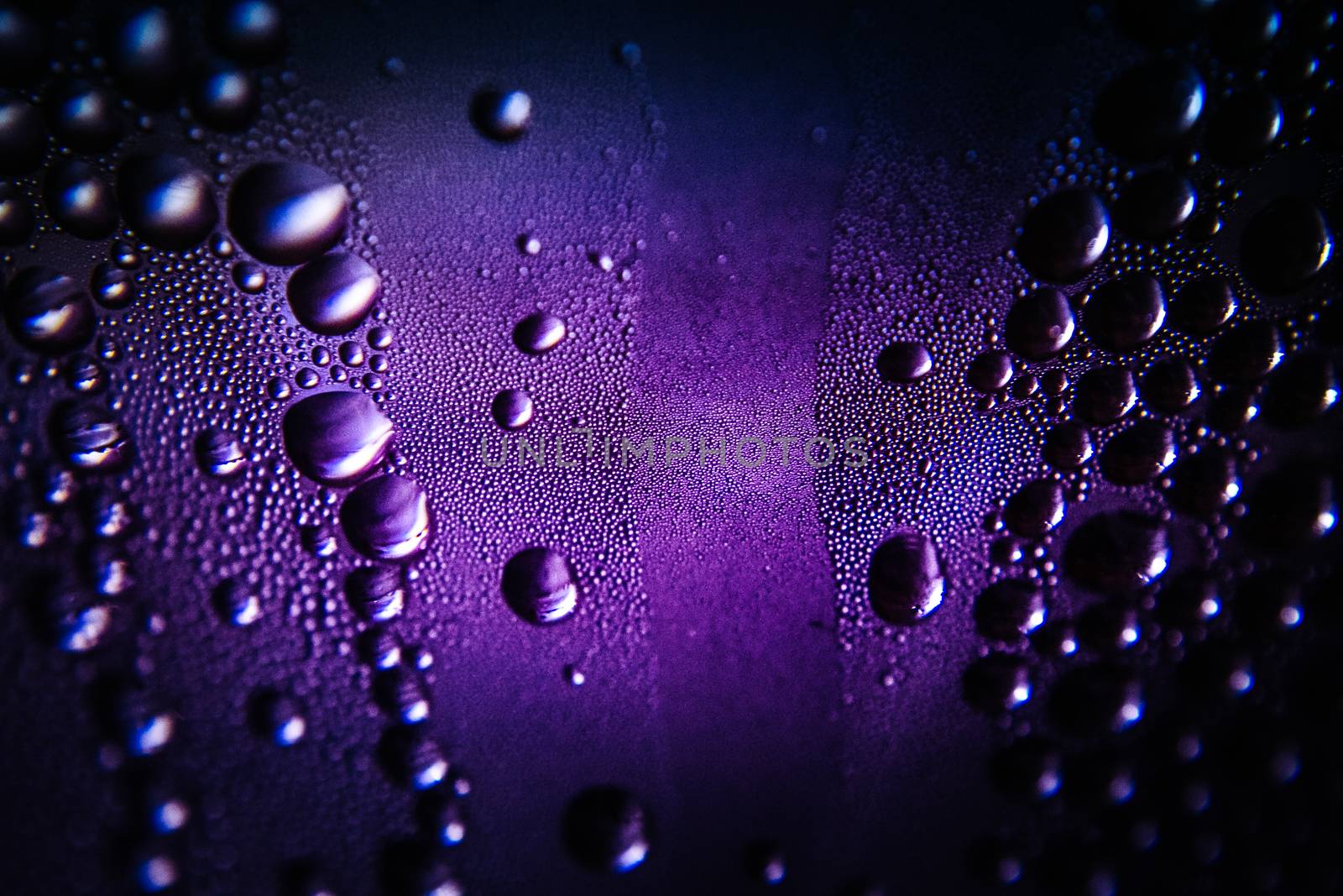 Texture of water drops on bottle by apichart