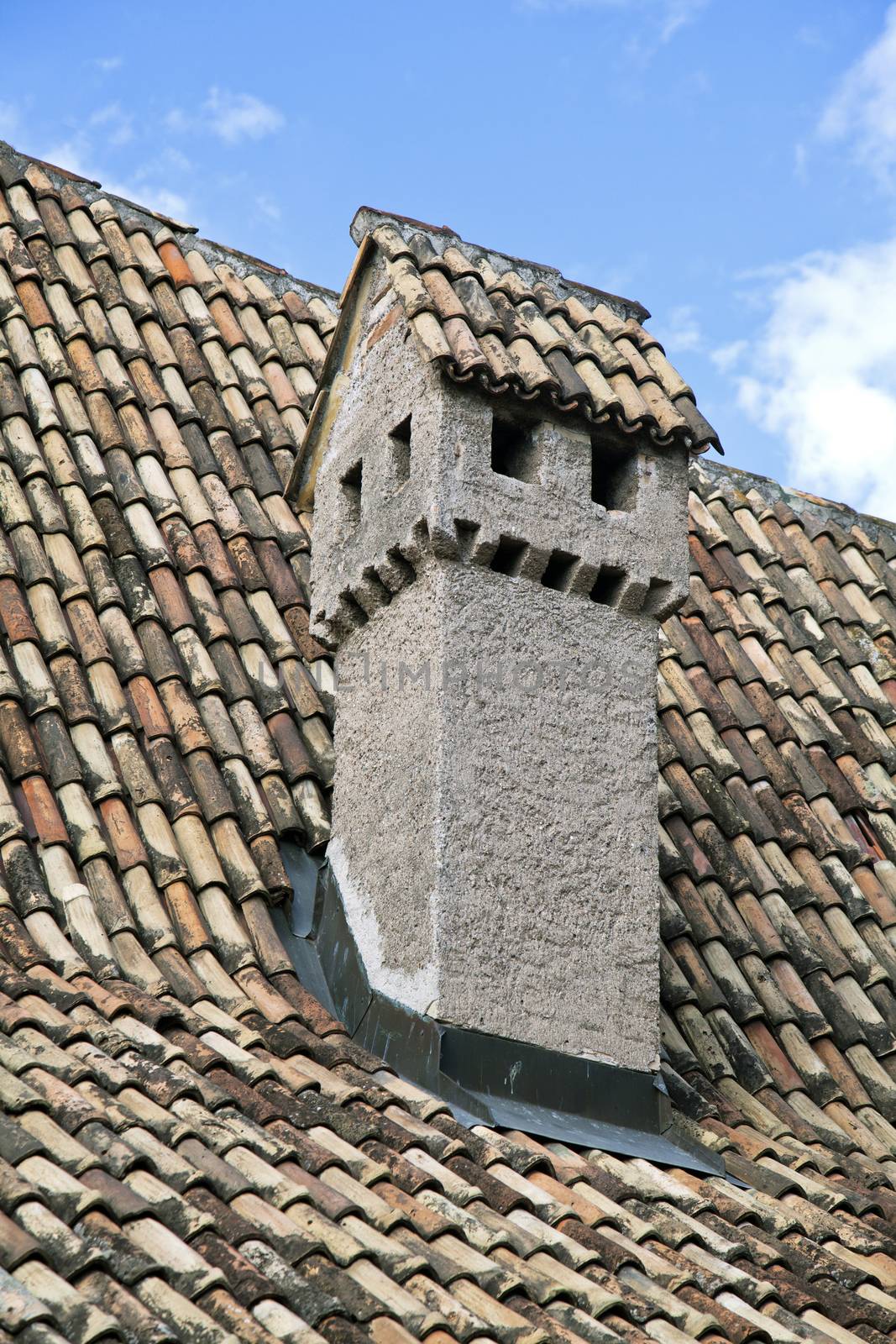 Chimney on a roof of an old residential house