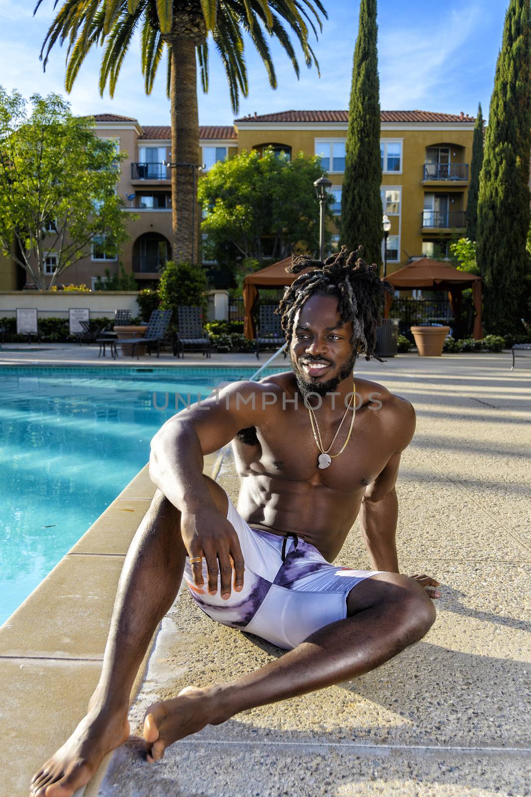 Muscular African American Man by the Pool by whitechild