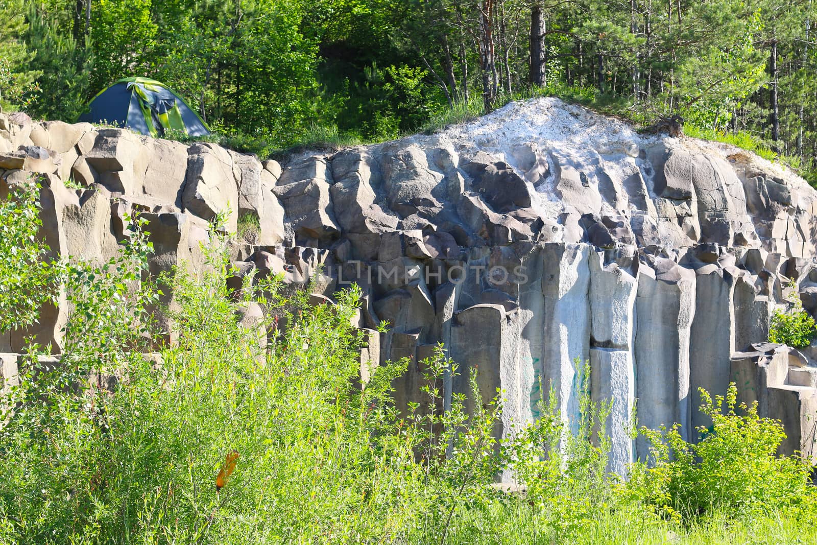 Tent weekend on basalt columns. Beautiful geological landscape